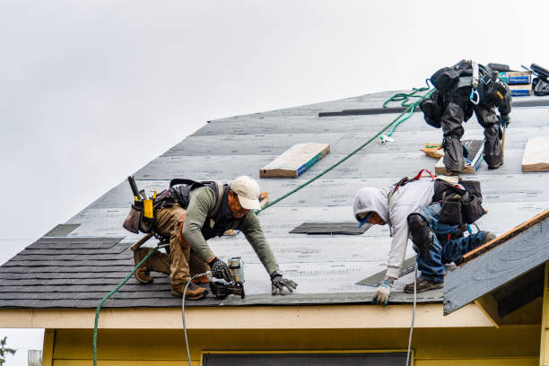Professional Roofing technician working in West Mystic, CT